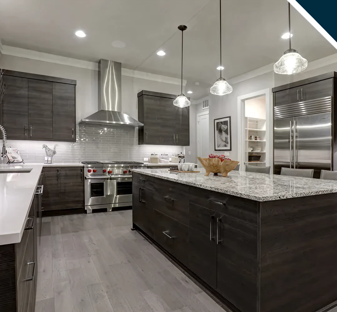Sleek kitchen featuring pendant lights